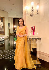 SHIVANI GIRDHAR IN SUNSHINE YELLOW RUFFLE SHARARA SAREE