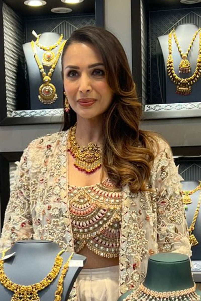 MALAIKA ARORA IN SCARLET ORGANZA JACKET